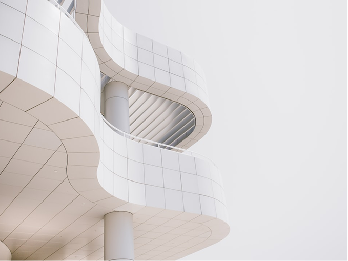 Close architectural detail of a gridded, curving surface